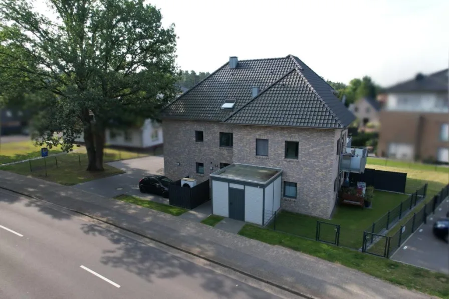 Straßenansicht - Haus kaufen in Wildeshausen - Wildeshausen: vollvermietetes KFW55-Bj 2023- Appartementhaus mit 7 Wohnungen (40 - 50 m² Wohnfläche)