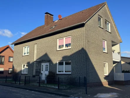 Straße - Haus kaufen in Harpstedt - Harpstedt: Gepflegtes 4-Familienhaus mit Carportanlage in zentraler Lage 