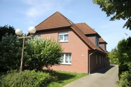 Hausansicht - Wohnung mieten in Wildeshausen - 3- Zimmerwohnung mit Balkon im beliebten Wohngebiet "Schulzentrum"