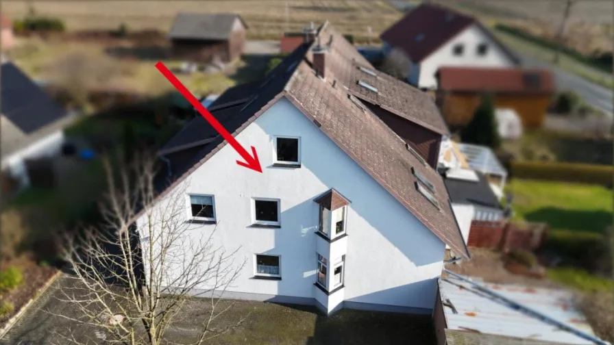 von oben - Wohnung kaufen in Wildeshausen - Vermietete Eigentumswohnung im gewachsenen Wohnviertel im teilunterkellertem 6 FH Wildeshausen