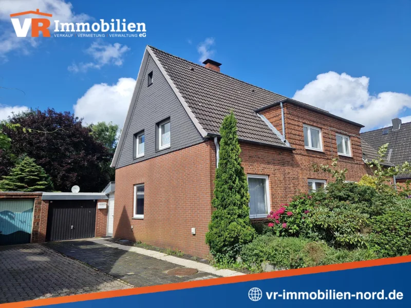 Die Doppelhaushälfte mit eigener Garage - Haus kaufen in Schleswig - Solide Doppelhaushälfte auf Erbbaugrundstück in Schleswig-Nord!