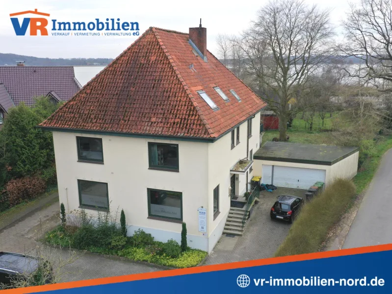 Die Vorderansicht der Immobilie - Haus kaufen in Schleswig - Solides Wohn- und Geschäftshaus in gefragter Lage von Schleswig an der Schlei