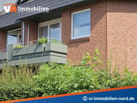 2-Zimmer-Etagenwohnung mit Loggia - Wohnung kaufen in Büdelsdorf - Charmante 2-Zimmer-Eigentumswohnung in zentraler und ruhiger Lage