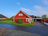 Die Südseite mit Blick auf das Doppelcarport