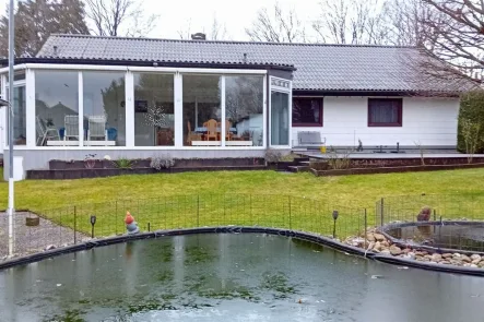 Titelbild - Haus kaufen in Rosengarten - Bungalow mit Wintergarten