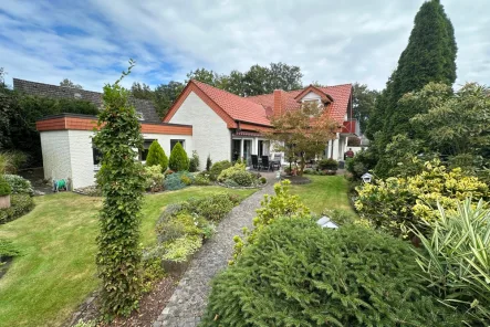 Rückansicht - Haus kaufen in Nordhorn - Haus mit vielen Nutzungsmöglichkeiten!