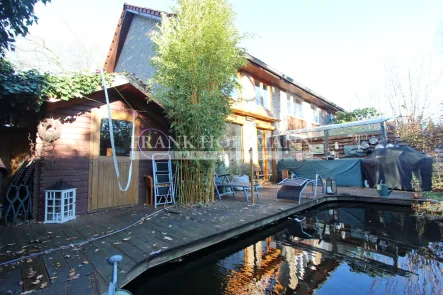 Garten - Haus kaufen in Hamburg - Gemütliches Endreihenhaus mit Gartenidylle in Hamburg-Sülldorf