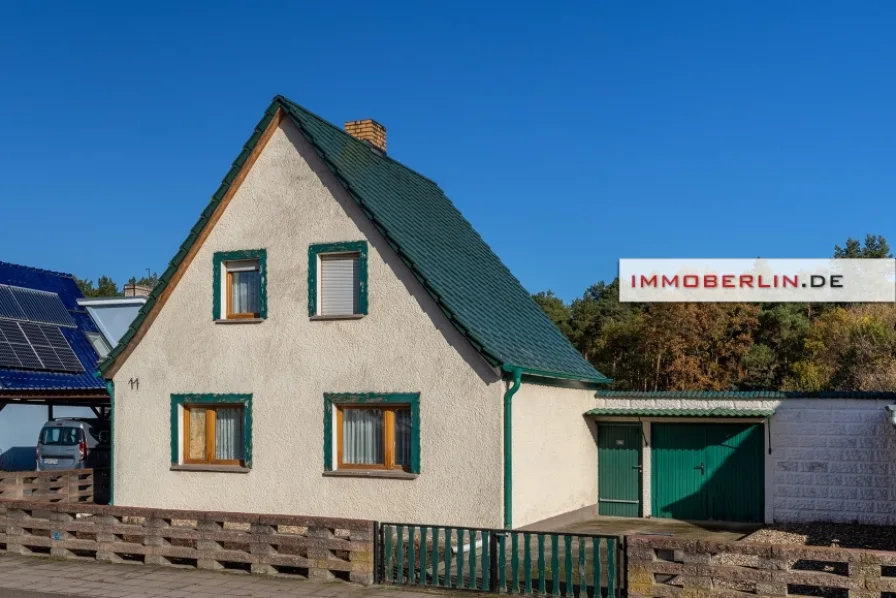 1672405138-012.jpg - Haus kaufen in Treuenbrietzen - IMMOBERLIN.DE - Schlichtes Einfamilienhaus auf herrlichem Grundstück am Wald