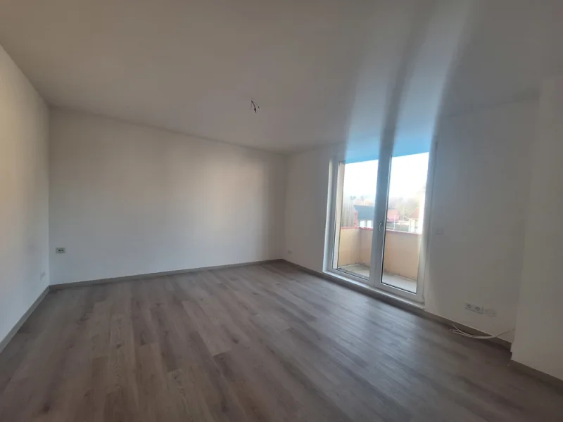 Wohnzimmer mit Balkon