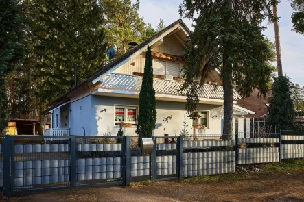  - Haus kaufen in Mühlenbecker Land - DEUTSCHMANNN IMMOBILIEN ***** ivd - Raumwunder mit Kamin und Wald im Rücken im ruhigen Zühlsdorf!