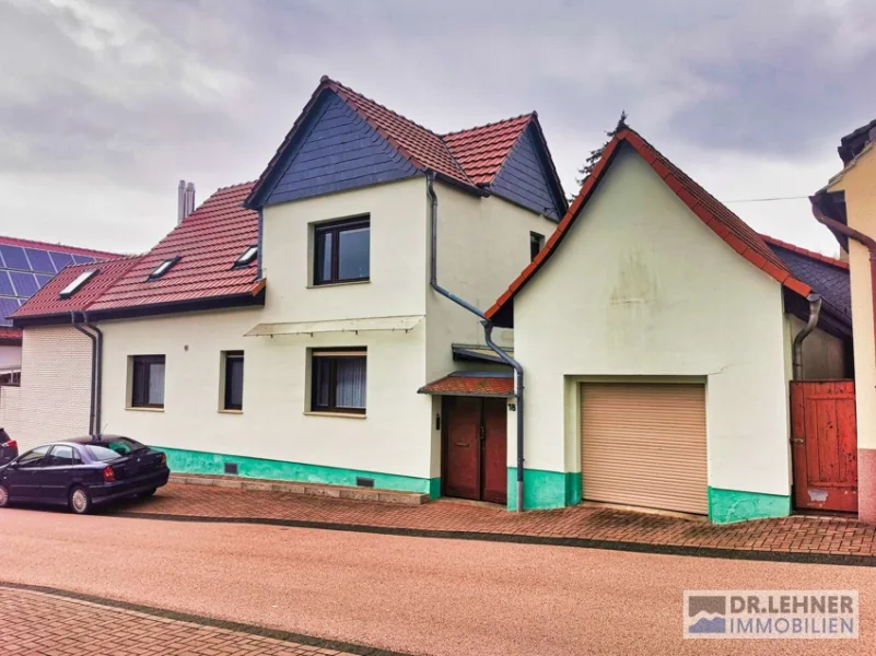 Haus kaufen bei Eisleben - Haus kaufen in Wimmelburg - Dr. Lehner Immobilien NB -Schmuckes Stadthaus in gepflegter Nachbarschaft