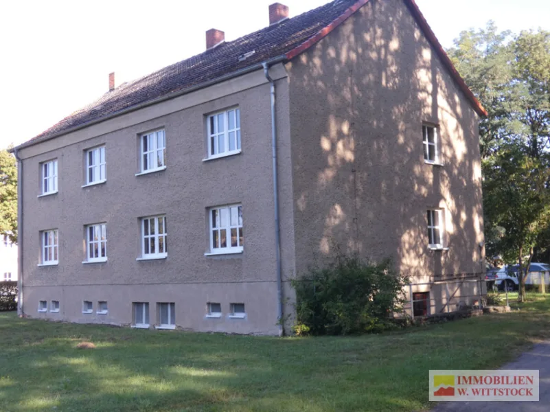 Seitenansicht 1 - Haus kaufen in Wolfshagen - Mehrfamilienhaus mit 4 Wohnheinheiten in Wolfshagen