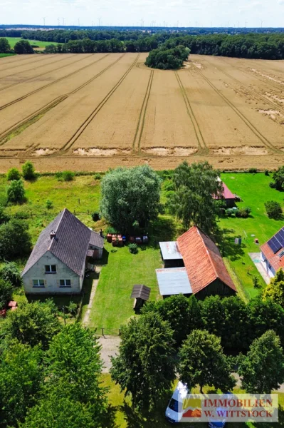 Grundstück - Haus kaufen in Gülitz-Reetz / Wüsten-Vahrnow - Renovierungsbedürftiges Einfamilienhaus mit großem Grundstück in ruhiger Wohnlage mit Weitblick