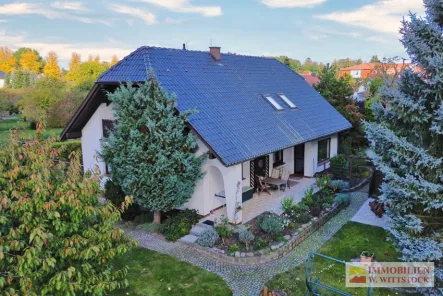 Rückansicht - Haus kaufen in Pritzwalk - Großes Grundstück mit großzügigem Einfamilienhaus in ruhiger Wohnlage