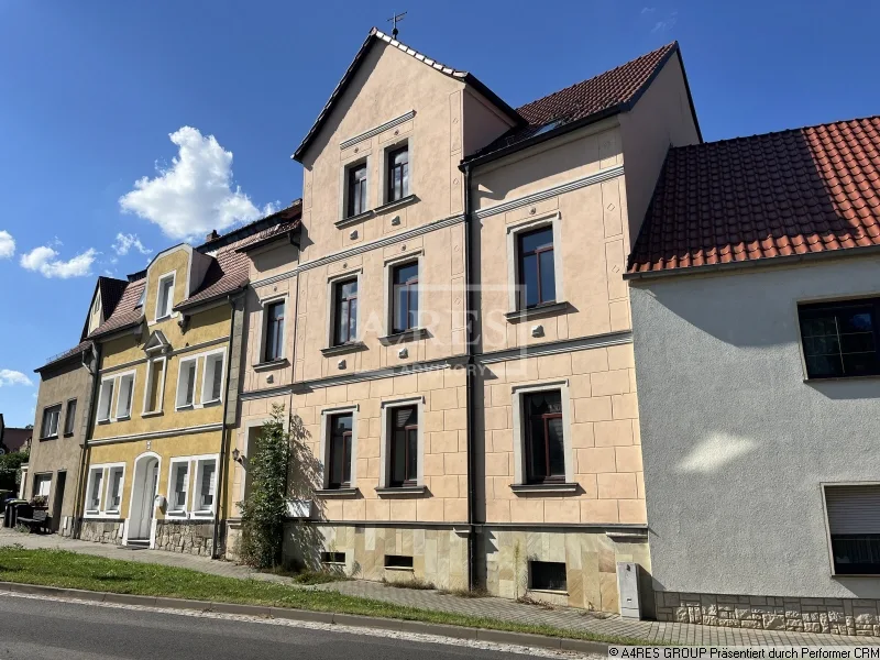 Objektansicht - Zinshaus/Renditeobjekt kaufen in Strehla - Kleines Mehrfamilienhaus in Strehla für 415 EUR/m²