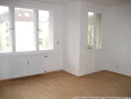 Wohnzimmer mit Balkonzugang