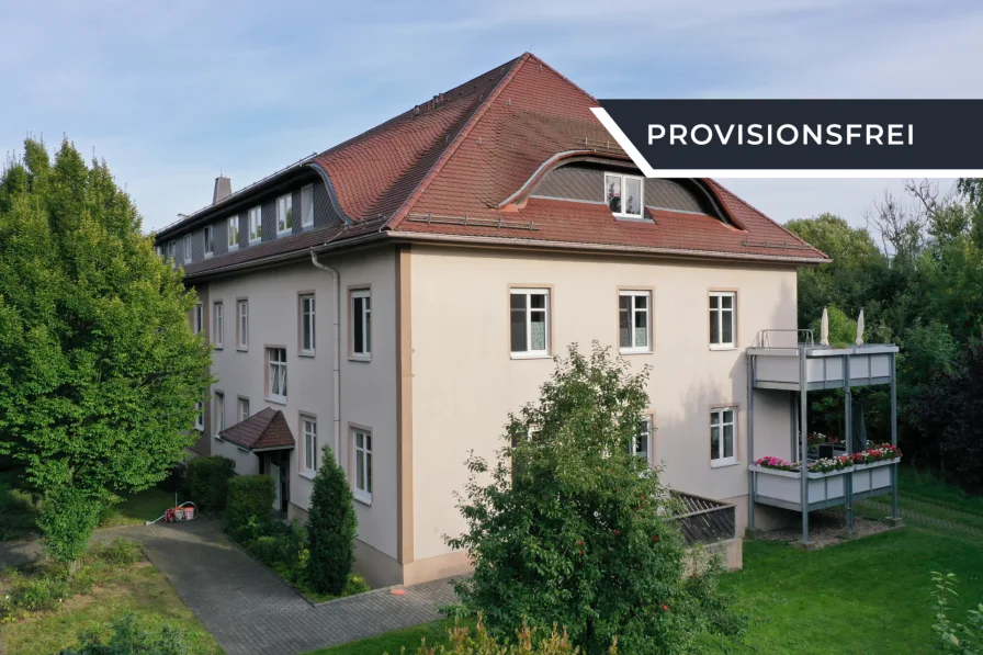 Außenansicht - Wohnung kaufen in Oschatz - Unvermietete 3-Zimmer-Maisonette mit Energieklasse B & Balkon in grüner Lage