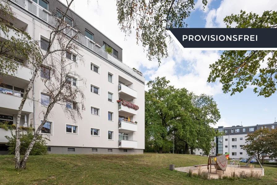 Außenansicht - Wohnung kaufen in Berlin - Vermietete 3-Zimmerwohnung mit Balkon & Carport im grünen Dahlem