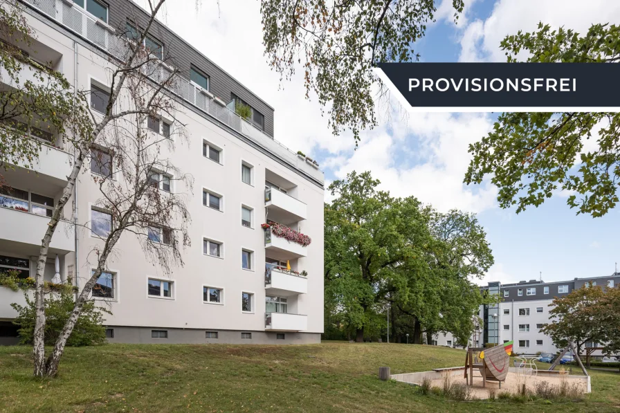 Außenansicht - Wohnung kaufen in Berlin - Mit Balkon & inkl. Carport: Energieeffiziente 3-Zimmerwohnung im grünen Dahlem