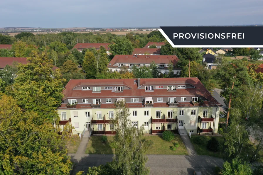 Außenansicht - Wohnung kaufen in Oschatz - Vermietete 2-Zimmerwohnung mit Balkon in grünem, ländlichen Oschatz