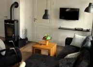 Wohnzimmer mit Kamin