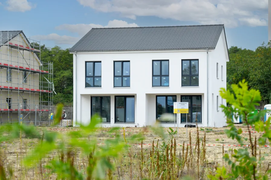 bezugsfertig - Haus kaufen in Beelitz - Starkes Investment, die Mieter können Sie sich aussuchen.