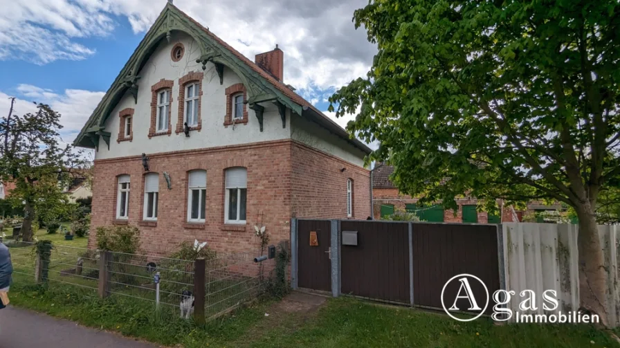 Ansicht Haus - Haus kaufen in Niedergörsdorf / Altes Lager - Vermietetes Einfamilienhaus mit Nebengebäude auf sehr großem Grundstück mit viel Baufläche