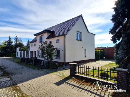 Haus mit Werkstatt 2 - Haus kaufen in Küstriner Vorland / Manschnow - Bezugsfreies Wohnhaus mit beheizter Werkstatt, Lagerhalle, Doppelgarage und Wintergarten