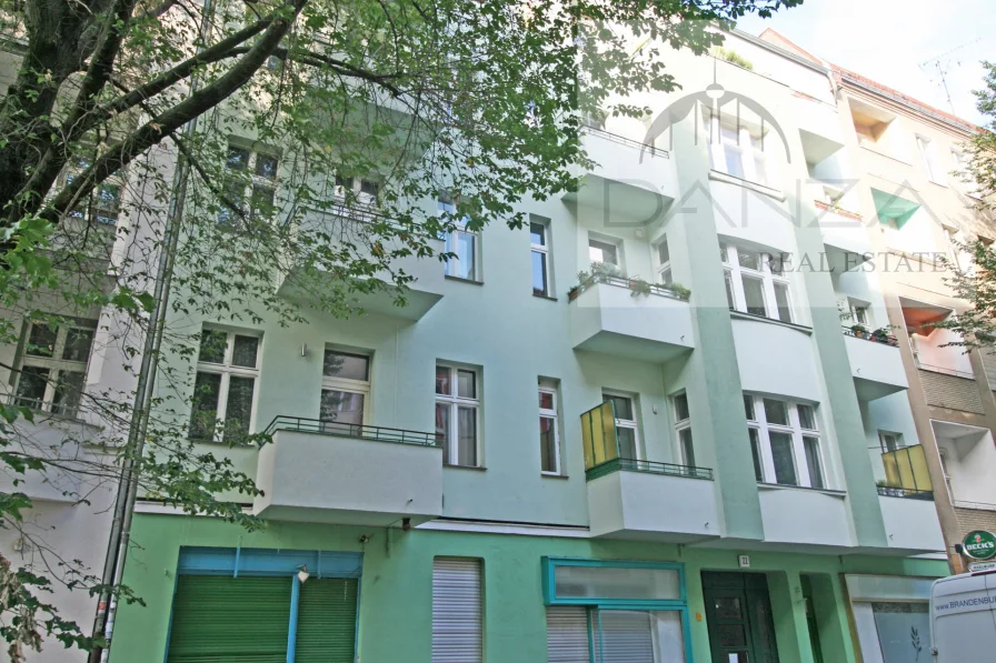 Hausansicht - Wohnung kaufen in Berlin - Im Sprengel-Kiez zur Kapitalanlage: Altbau-Wohnung mit Gartenfläche