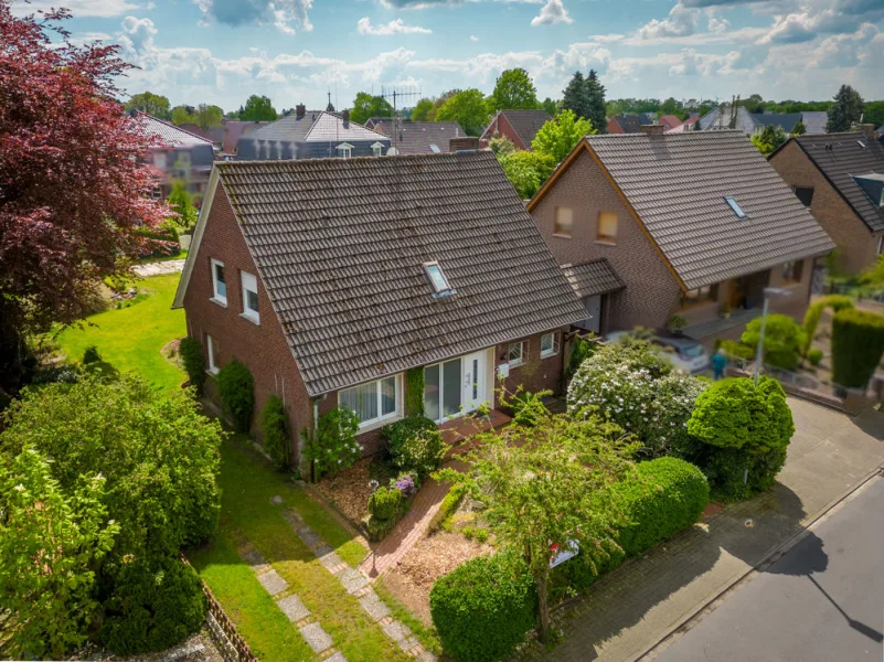 Vorderansicht - Haus kaufen in Werlte - Preissenkung ! sanierungsbedürftiges Einfamilienhaus nebst Garage auf sehr schönem Grundstück!