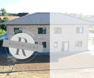 Reserviert - Haus kaufen in Geeste - schlüsselfertige Neubau-Doppelhaushälfte KfW55 nebst Aluminium-Carport und massivem Geräteraum!