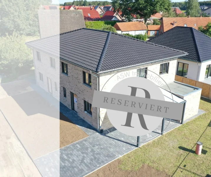 reserviert - Haus kaufen in Geeste - Schlüsselfertige Neubau-Doppelhaushälfte KfW55 nebst Aluminium-Carport und massivem Geräteraum!