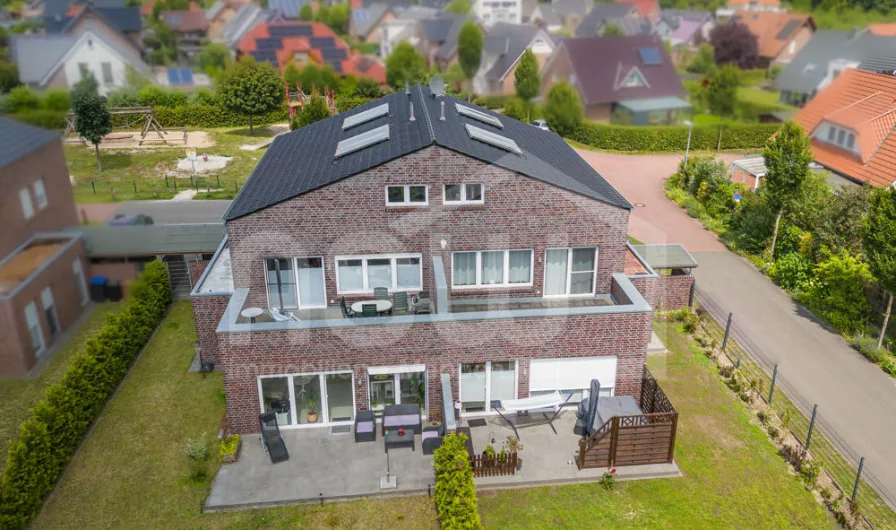 Rückansicht - Haus kaufen in Meppen - Achtung Kapitalanleger! Neuwertiges, vermietetes 4-Parteien-Haus!