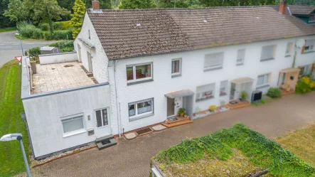 Vorderansicht - Haus kaufen in Meppen - Renoviertes Reihenmittelhaus nebst ebenerdigem Flachdachanbau (2009) und Garage!