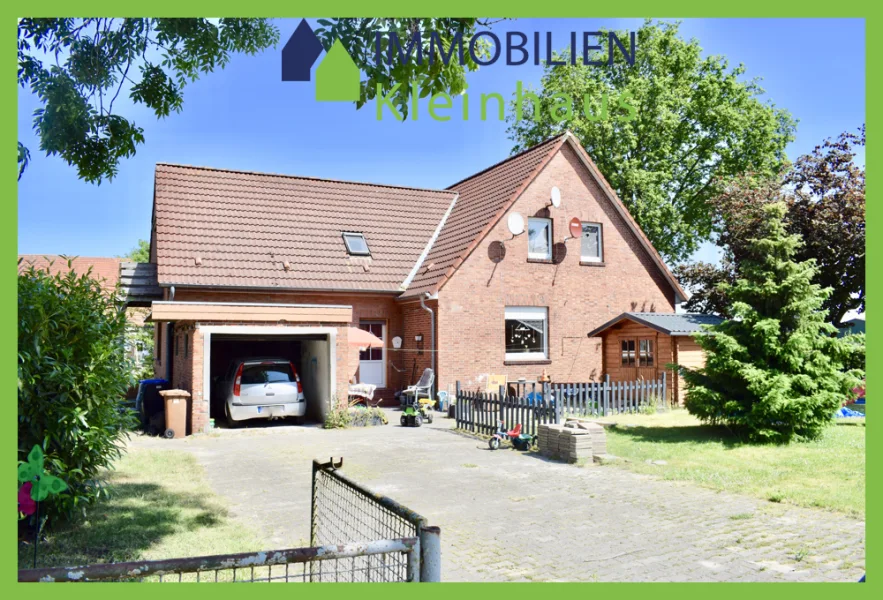 Straßenansicht - Haus kaufen in Papenburg - Geräumiges Ein- oder Zweifamilienhaus mit Wohlfühlcharakter in der Stadt Papenburg, in unmittelbarer Nähe zur Ems zu Kaufen!