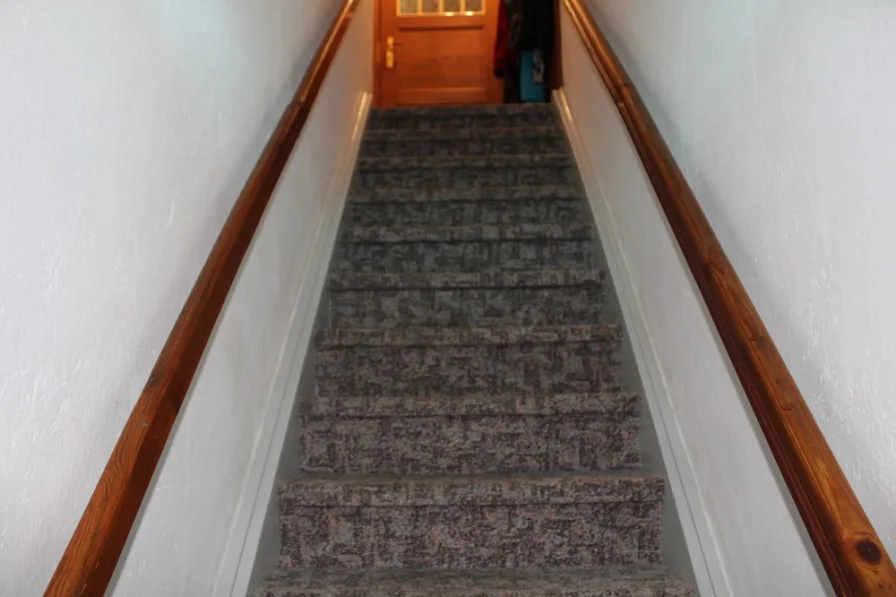 Die Treppe zum Obergeschoss