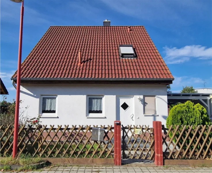 Objektansicht - Haus kaufen in Taucha - Vermietetes Einfamilienhaus in Taucha!