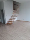 Wohnzimmer mit Treppe