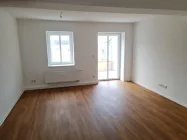 Wohnzimmer mit Balkon