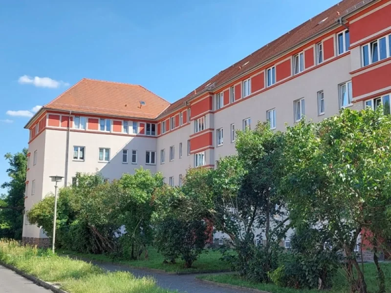 Gebäude - Wohnung kaufen in Leipzig - Vermietete Eigentumswohnung in Leipzig