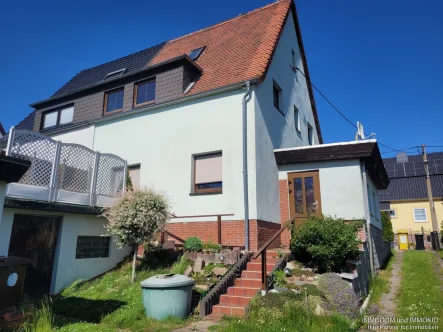 Ansicht vom Garten - Haus kaufen in Zwickau / Marienthal - Einfamilienhaus (DHH) für rd. 835,- EUR/mtl. Kapitaldienst in Zwickau-Marienthal zum Kauf!