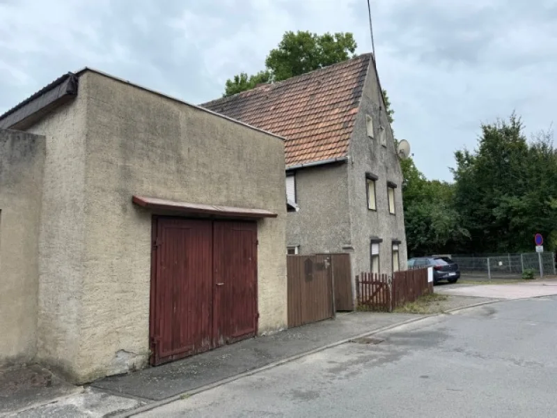 Ansicht - Haus kaufen in Bennewitz / Pausitz - SCHNÄPPCHEN: Einfamilienhaus mit Garage und Nebengelass