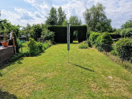 Ansicht Garten - Haus kaufen in Schkopau - gepflegtes Reihenmittelhaus mit traumhafter Aussicht ins Grüne