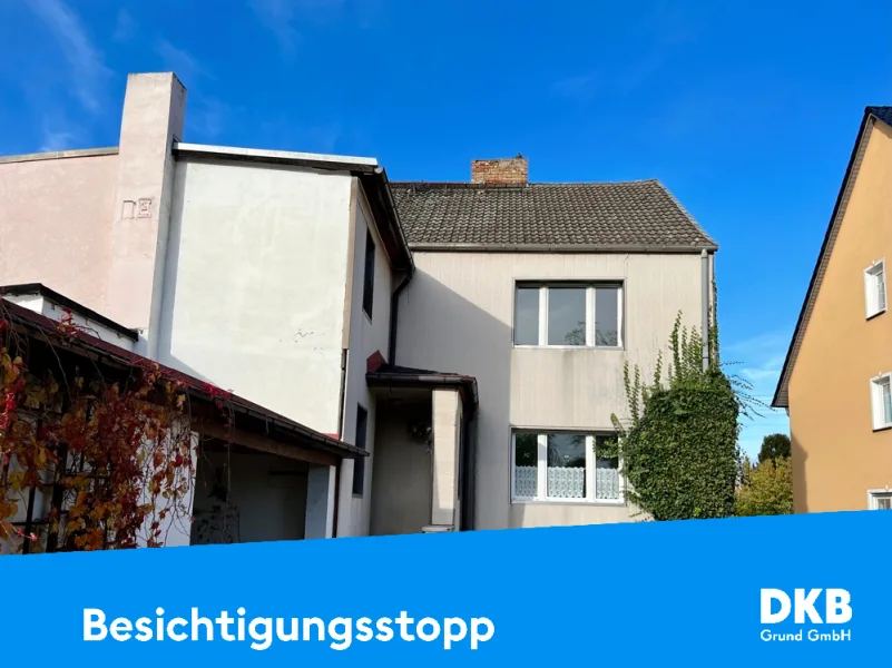 Besichtigungsstopp - Haus kaufen in Dessau-Roßlau - Doppelhaushälfte mit  Potential und schönem Garten