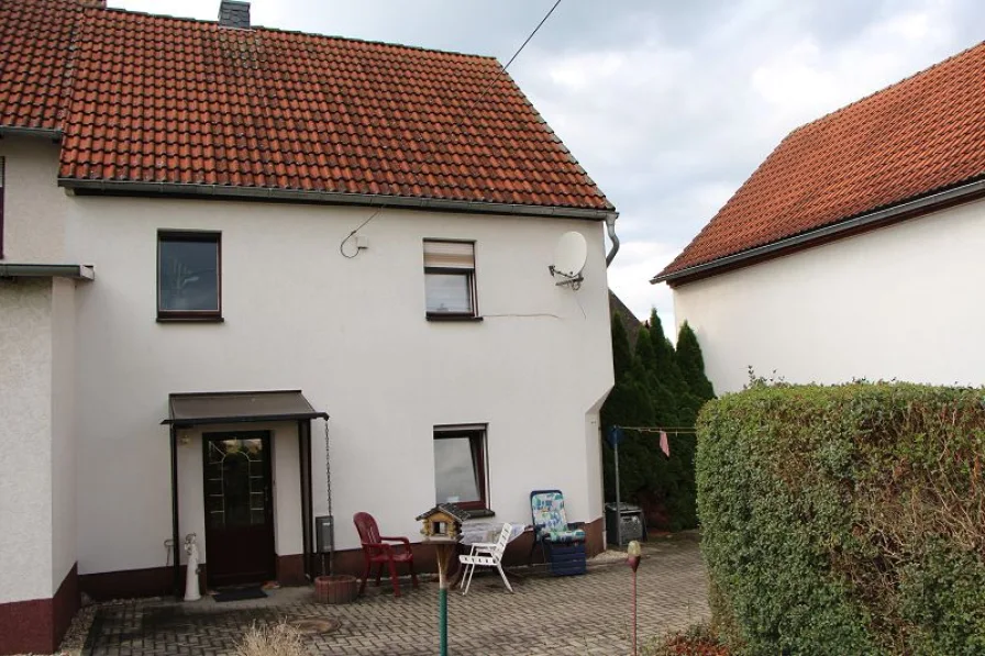 Doppelhaushälfte - Haus kaufen in Frohburg - Frankenhain b. Geithain: san. DHH mit ca. 91m² Wfl.  und gr. Nebengeb.