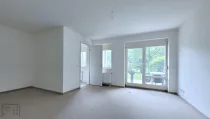 Wohn,-Schlafzimmer der 1 Zimmer Terrassenwohnung im EG