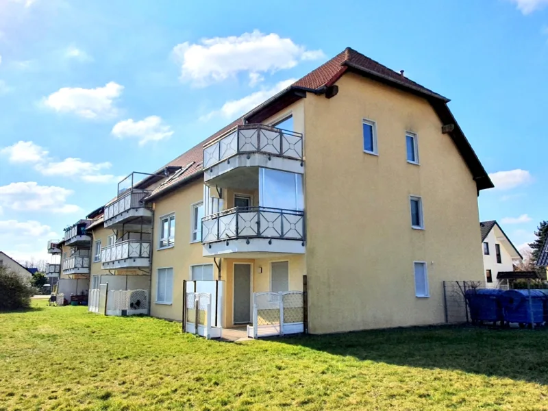 Gebäudeansicht  - Wohnung kaufen in Sandersdorf-Brehna - Solides Investment // mit Balkon & Stellplatz // vermietet