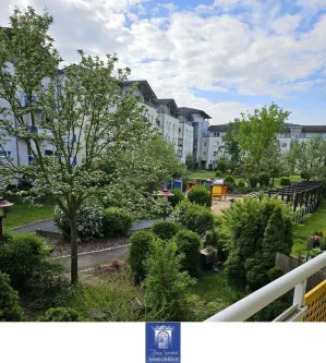 Innenhof  - Wohnung kaufen in Freital - Schicker Wohnpark! Interessante Terrassen-Wohnung in grüner und ruhiger Umgebung!
