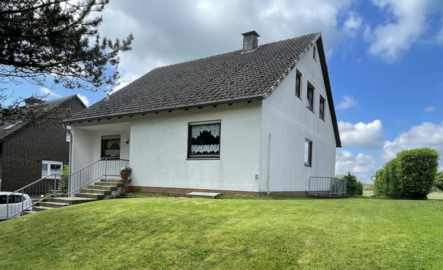 Titelbild - Haus kaufen in Holzdorf - Zweifamilienhaus zwischen Ostsee und Schlei