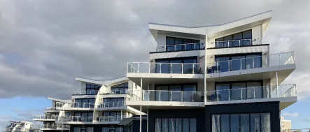 Titel - Wohnung kaufen in Wendtorf - Kapitalanlage mit Meerblick! Luxus-Ferienwohnungen direkt an der Ostsee
